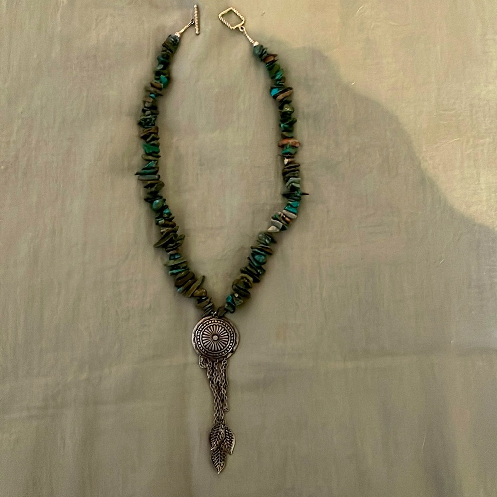 Gorgeous handcrafted possible turquoise chip with drop necklace.
